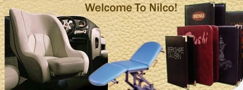 Welcome sign with a car and a blue examination table.