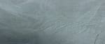 Close-up of textured gray fabric surface.