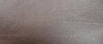 Close-up of textured brown surface.
